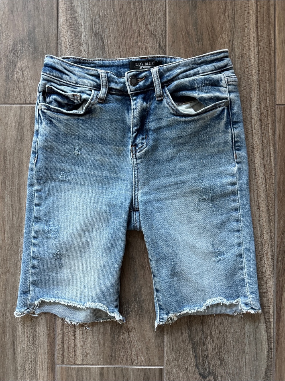 Judy Blue Faded Blue Distressed Denim Bermuda Shorts. Women’s size Small